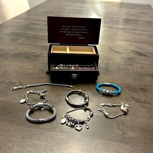 Brighton jewelry box and seven bracelets with various charms